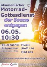 ein Motorrad fährt in den Sonnenaufgang